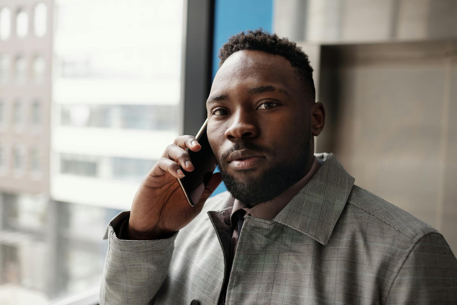Nigerian realtor on a call, every WhatsApp thread and email already in the CRM